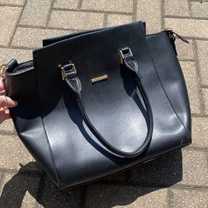 black structured tote or crossbody purse